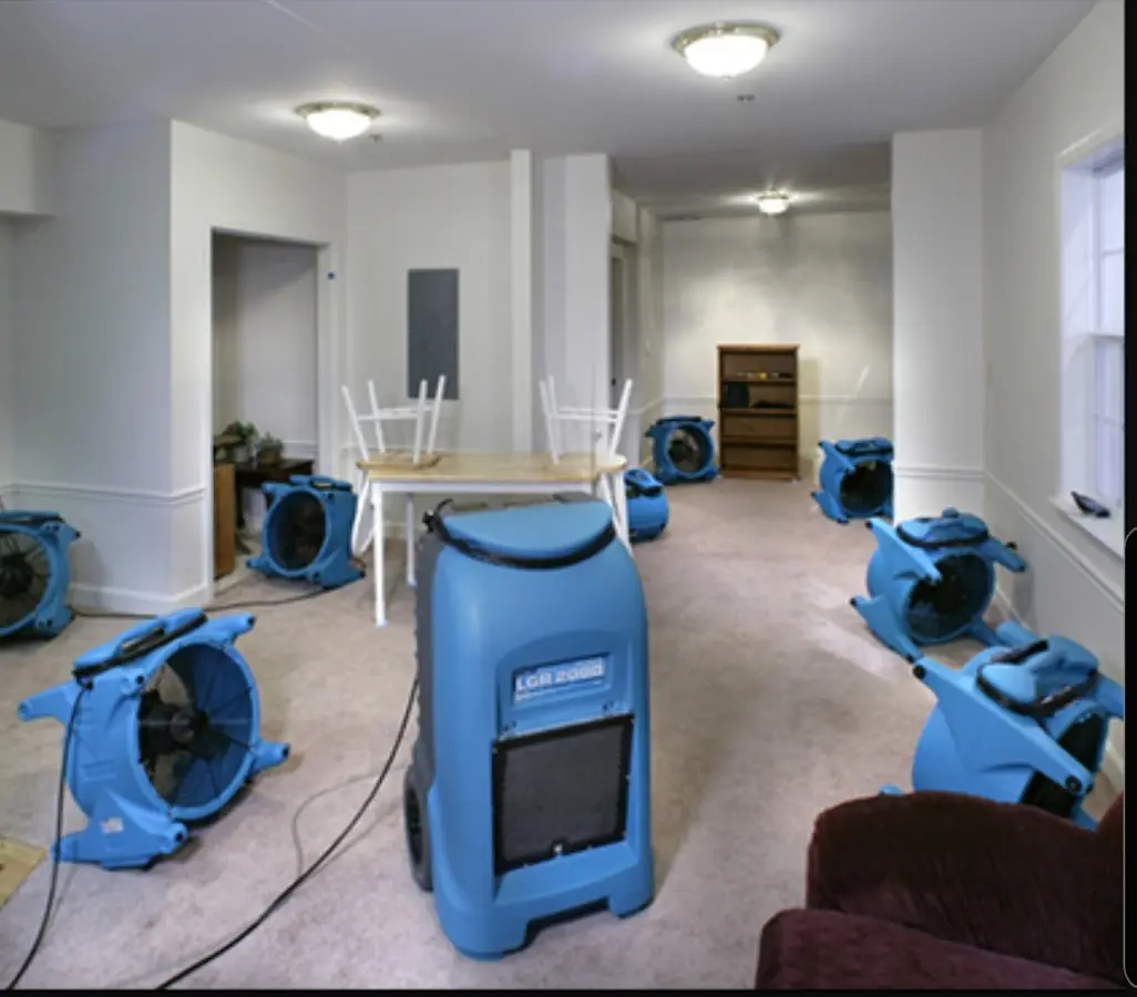 Air movers and dehumidifier setup for Water Damage Restoration in Storm Lake